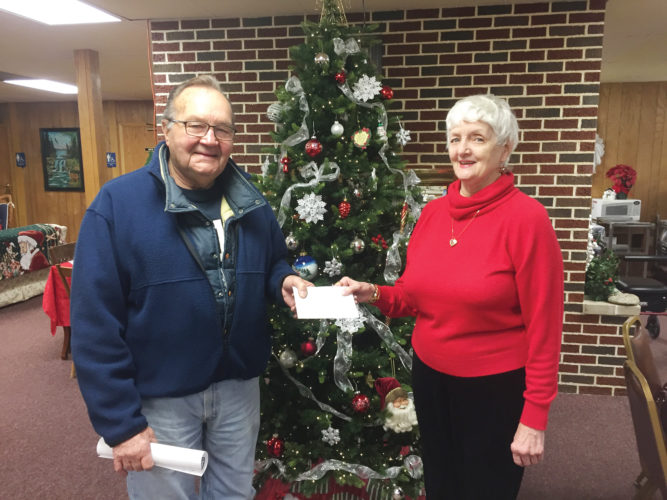 Photos submitted to Times Observer Sheffield Homemakers Club Treasurer Nancy Benson is pictured with Jack Cashmere, Treasurer of the Sheffield Ecumenical Food Pantry, Nancy is handing Jack a monetary gift to the food pantry from the Homemakers Club.